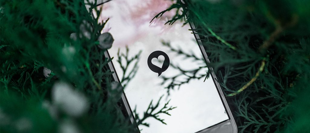 Mobile phone with love heart on screen