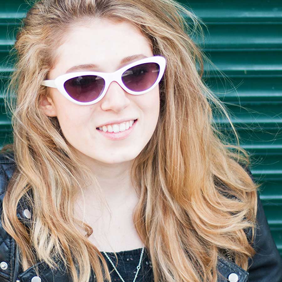 Female in white-rimmed sunglasses