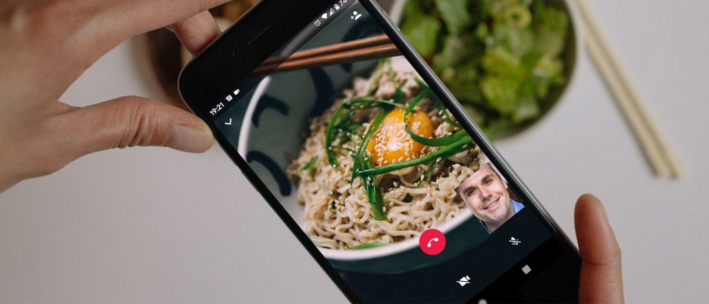 WhatsApp video call during an online dinner date